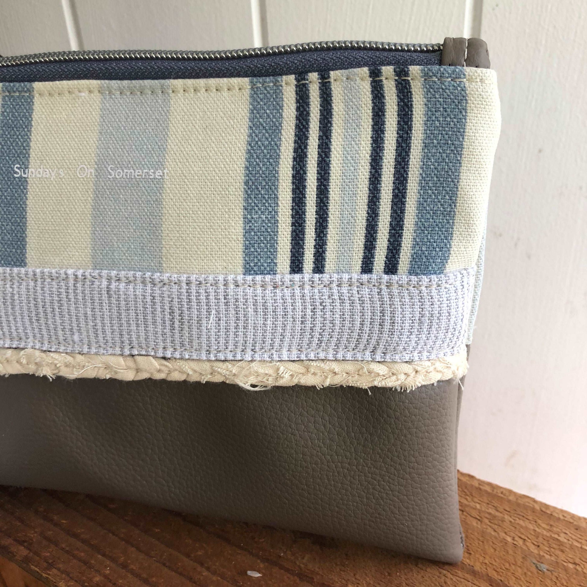Striped tassel Medium Clutch Bag